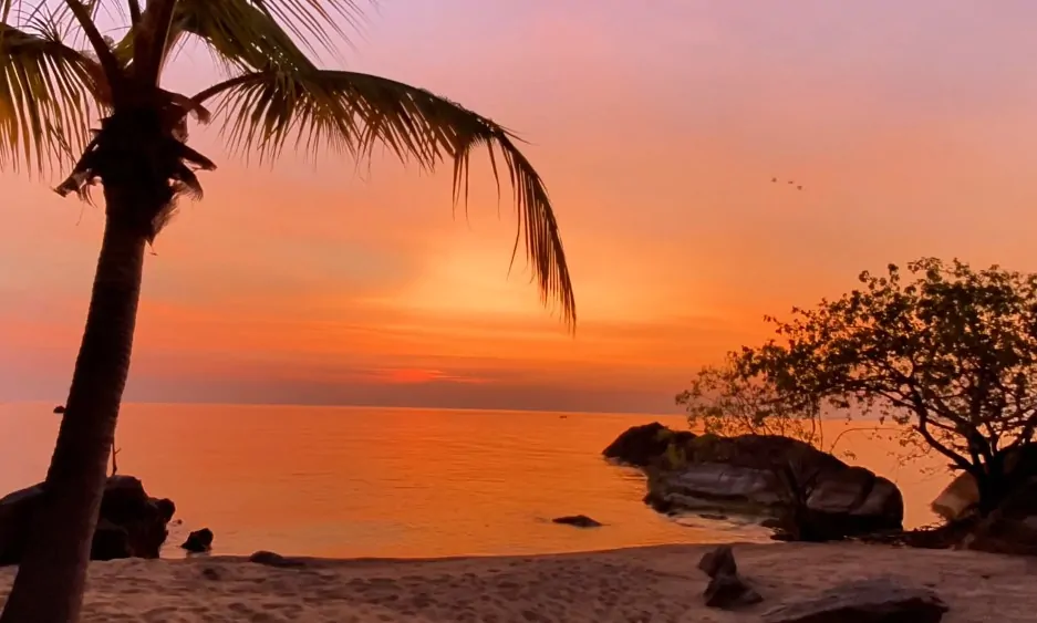Golden hour at the tranquil Lake Malawi shoreline
