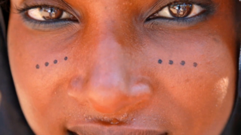 A Fulani woman with traditional facial tattoos