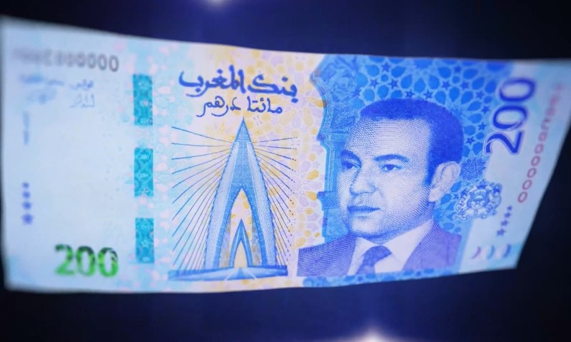 Close-up of a crisp, blue 200 Moroccan Dirham banknote