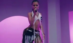 Tyla singing in a studio