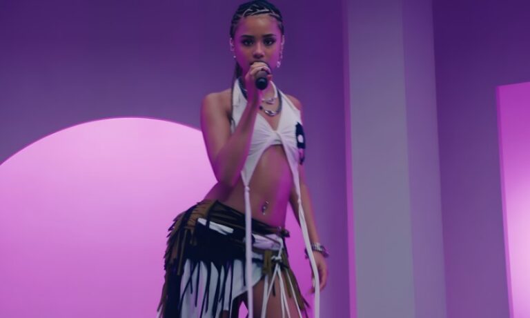 Tyla singing in a studio