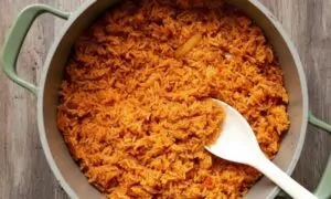 A pot of vibrant orange Jollof rice