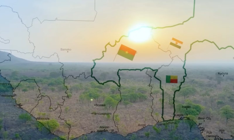 Map overlay on an African landscape at sunrise shows national borders and flags
